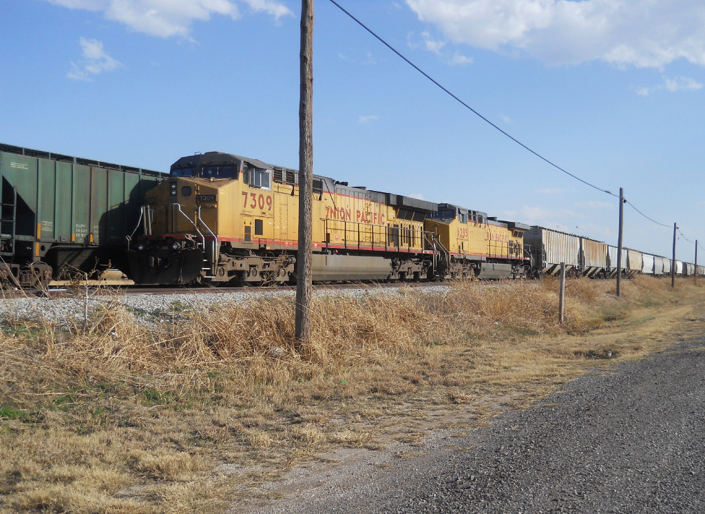 UP 7309  27Feb2011  Taking Sunday Off NB along the Old Burk Hwy in the WT&J yard 